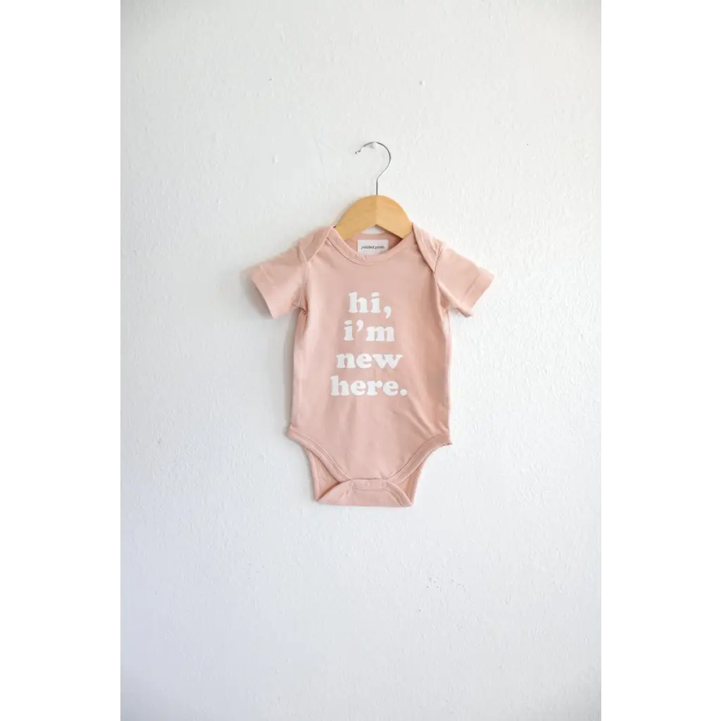 Hi, I'm New Here in Rose Organic Cotton Baby Onesie